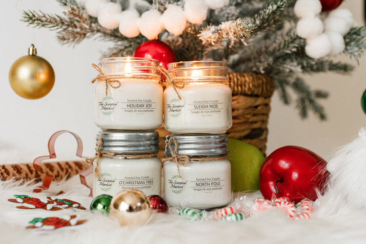 Four 8 oz The Scented Market Soy Wax Candles Lit