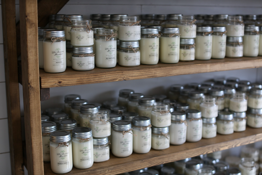 All Natural Soy Scented Candles on a wooden shelf