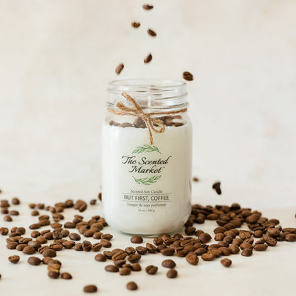 But First, Coffee 16 oz Soy Wax Scented Candle surrounded by coffee beans
