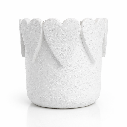 White textured basket with floral top on a white background