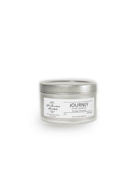 Journey Essential Oil 4 Ounce Scented Soy Wax Candle in a tin jar front view